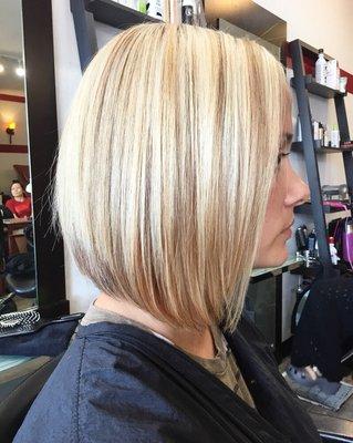 Stunning sleek platinum blonde bob done by Lindsay