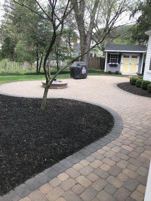 Patio cleaning and fresh mulch.