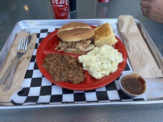 Pulled chicken, baked beans and potato salad with cornbread