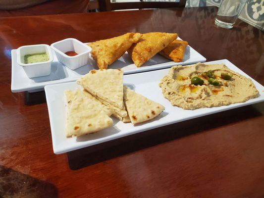 Samosas and hummus.