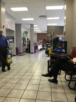 Watching the Olympics at Raleigh Tire.