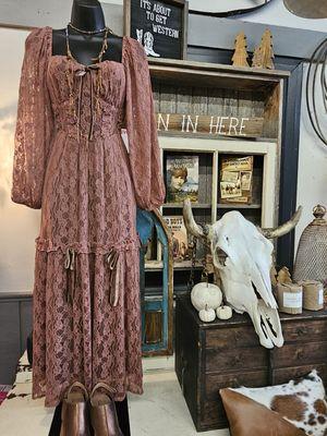 This is a gorgeous dress and we are so excited to have it for this fall and winter season. A must come and see to really appreciate it.