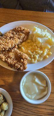 Chicken with mashed potatoes and mac and cheese