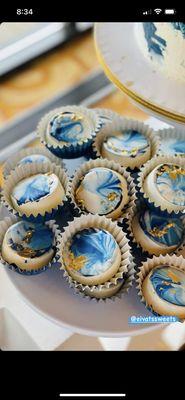 Chocolate covered Oreos with gold flakes