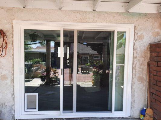 The outside of the sliding glass door. They insulated everything so well, the difference in sound level is crazy!