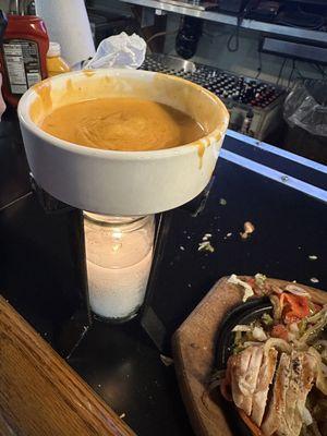 The queso is not fresh, it's out of a jar and heated by a candle.