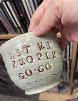 Handmade one of a king pottery mugs by Paul Mallory. Pick from your favorite Rainmakers lyrics.