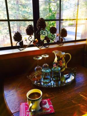 Enjoying freshly brewed coffee.... A lovely place to sit while I wait for my fiancé to shower, watching the blue jays outside.....