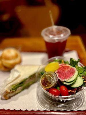 1/2 Tuna Sandwich with avocado  Cherry iced tea Garden Salad