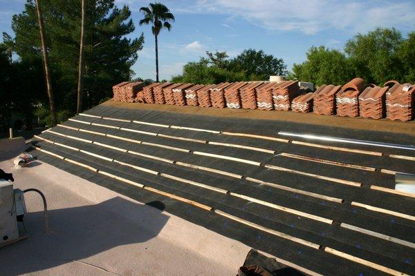 Tile roof in progress.