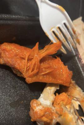 Bone is classic hot wing WITH FEATHERS IN IT!?!