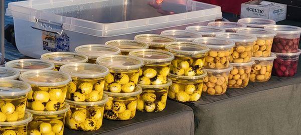 Mediterranean food, olives, yogurt balls, seasonings.