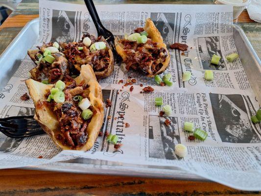 Loaded potato skins minus a few we'd already eaten.