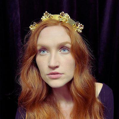 Flower Goddess 18K Gold Plated Hair Crown by Dauphines of New York features oversize flowers and sparkling crystals. Luxury Hair Accessories