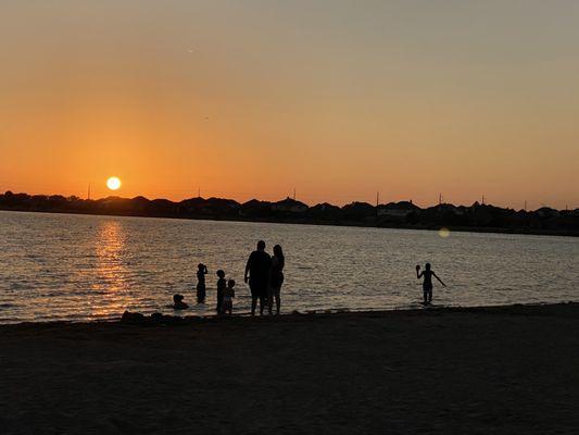 People enjoying man made beach.