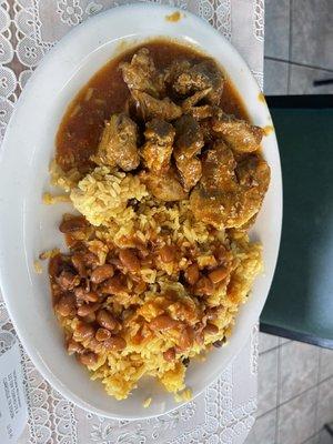 Stewed pork w/yellow rice and pintos