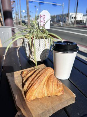 Butter croissant & hot latte with oat milk