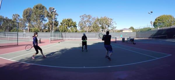 Ashley and Alvin learning the forehand stroke!