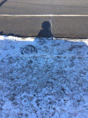 Sidewalk completely full of ICE very dangerous to board MBTA buses