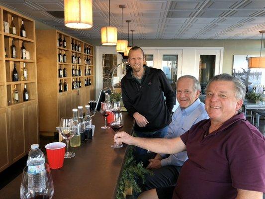 Winemakers/owners, Tom and Les McKenzie, trying new vintages with wine consultant Matt Ridge.