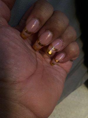 Light pink with chrome gold nails