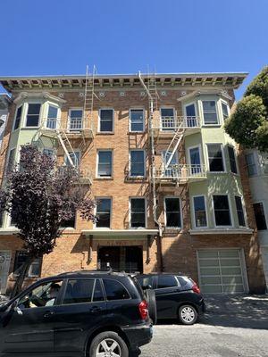 We installed new energy efficient windows facing the street in this building in San Francisco