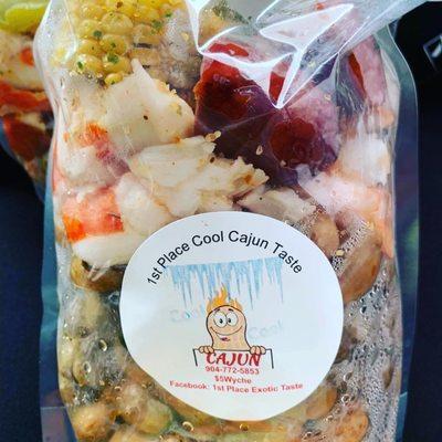 Cool Cajun Loaded
 Shrimp, crab, egg, corn, sausage 
 Substitute any meat