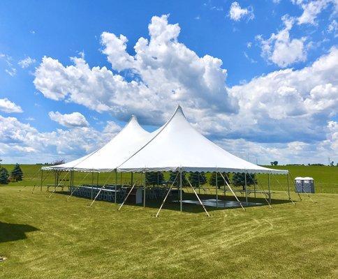 40x60 tent with seating and a dance floor