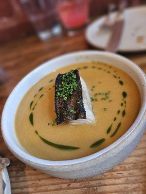 Dungeness crab bisque, and black cod with herb oil