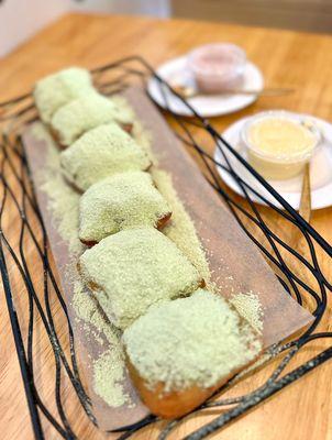 Moignet - dusted with matcha powdered sugar.  Sauces were: strawberry & yuzu.