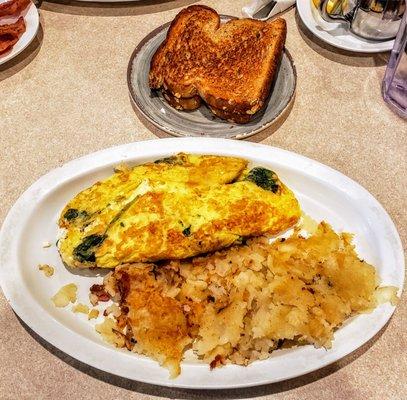 Spinach and Feta Omelet with Hash Browns at City Limits Diner Tecumseh