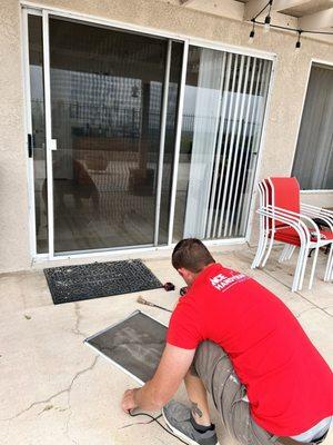 Phillip assembled the screen frame for a 2nd story room and re screened patio  door.