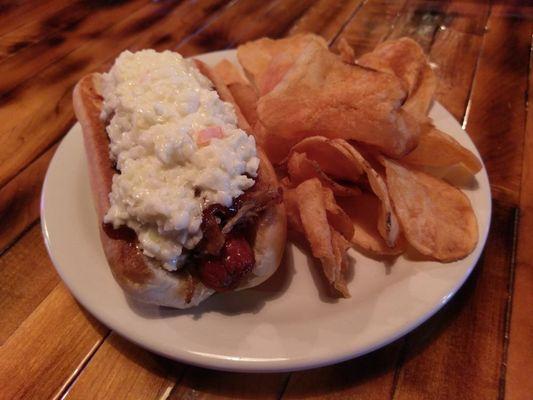 The "Burg" ripper. fried pork frankwith BBQ pulled pork and topped with coleslaw. All meats farm fresh from Tier Three Heritage Products.