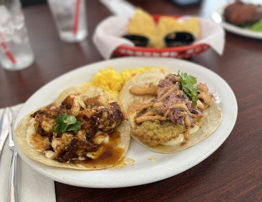 Spicy shrimp taco and beer batter fish taco. Served with rice. Yum.