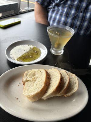 Piping hot bread from the oven and dirty martini