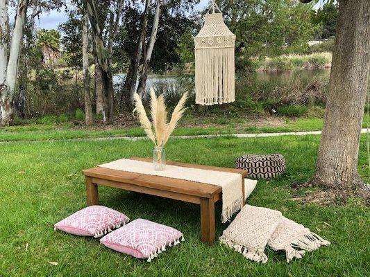 Pillows and macrame runners for your boho themed party