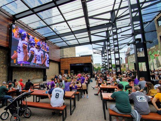 Watching the Packers beat the Vikings outdoors at The Beer Garden.