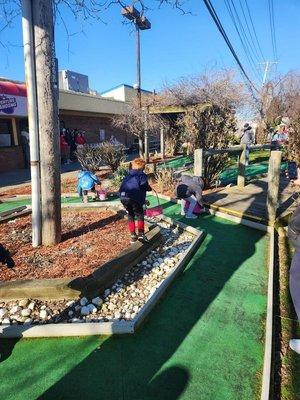 My son at their awesome mini golf course