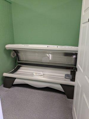 Tanning beds with bronzing bulbs, face tanners and body fans.