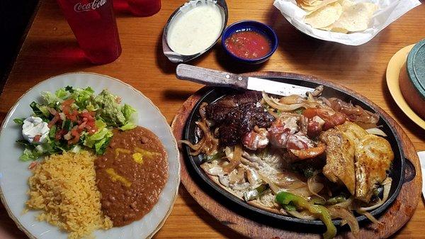 Marco's Favorite, steak, chicken, bacon shrimp, mushrooms, peppers, onions and side plate.  Very good!