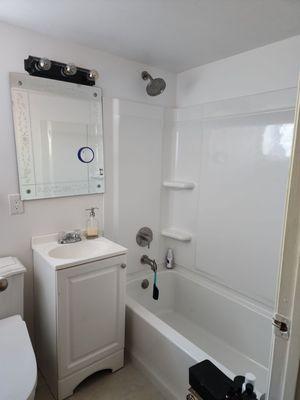 Complete bathroom renovation. 1930s pipes replaced. New bathtub, tile, walls.