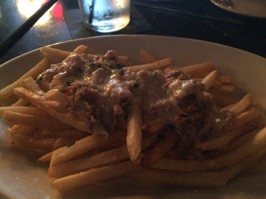 Pork pontine sauce was rich and creamy great variation of traditional poutine