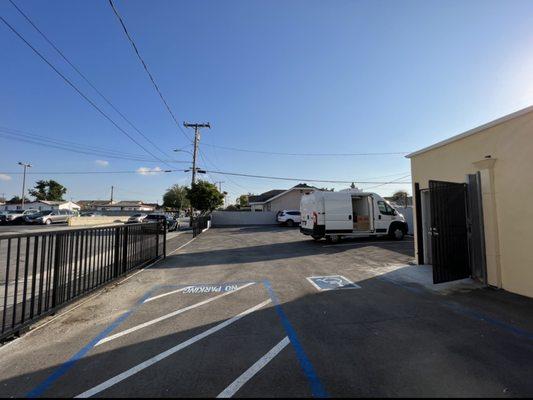 Spacious parking lot in the back, ring the doorbell to enter through the back door!