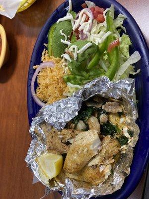 Tilapia, shrimp, spinach and mushrooms baked in foil  served with rice, avocado and lettuce salad - my favorite of light dishes.