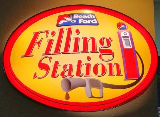 This is a close up of the Filling Station logo and sign.  Photo taken July 14, 2018.