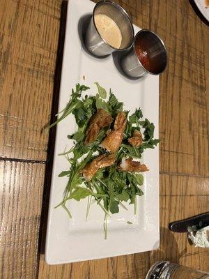 Shrimp appetizer only tails left after family devoured.  They loved every bite before I could get in pic!  100% recommend!