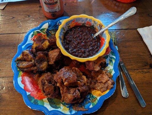 Braised beef oxtail with sweet plantains and black beans