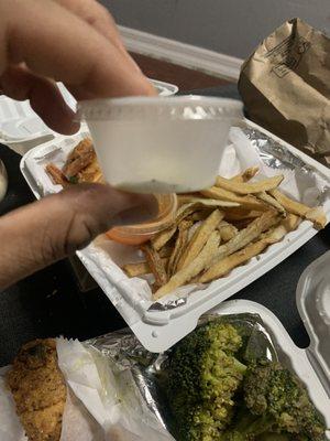 Empty container of tartar sauce