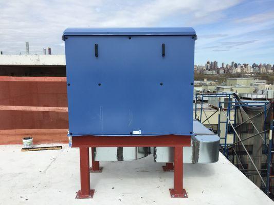 100% fresh air ERV unit with duct work on roof