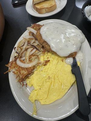 Chicken fried steak meal with sourdough toast